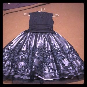 Navy blue Size 2 dress worn once.